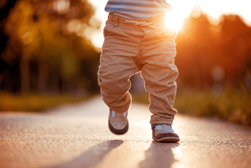 baby taking first steps